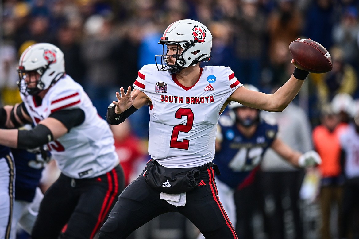 South Dakota quarterback Aidan Bouman (2) drops back to pass in the first quarter during an FCS semifinal game against Montana State at Bobcat Stadium on Saturday, Dec. 21. (Casey Kreider/Daily Inter Lake)