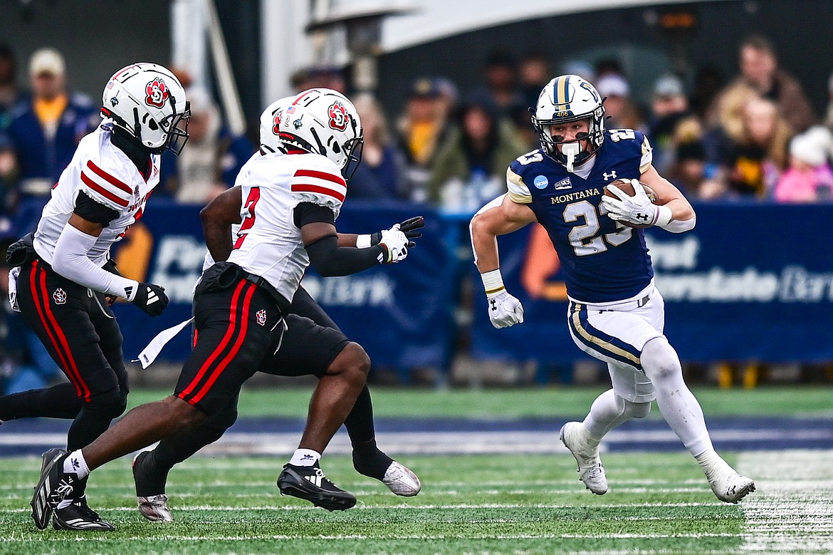 Montana State running back Adam Jones (23) picks up yardage on a run in the second quarter during an FCS semifinal game against South Dakota at Bobcat Stadium on Saturday, Dec. 21. (Casey Kreider/Daily Inter Lake)