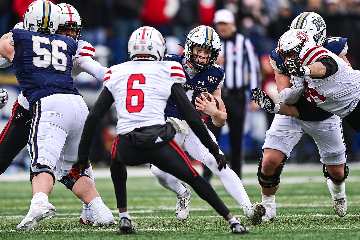 Montana State quarterback Tommy Mellott (4) picks up yardage on a run in the third quarter during an FCS semifinal game against South Dakota at Bobcat Stadium on Saturday, Dec. 21. (Casey Kreider/Daily Inter Lake)