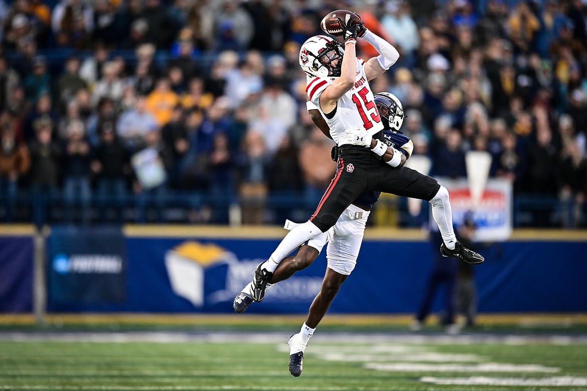 South Dakota wide receiver Jack Martens (15) holds on to a reception in the fourth quarter during an FCS semifinal game against Montana State at Bobcat Stadium on Saturday, Dec. 21. (Casey Kreider/Daily Inter Lake)