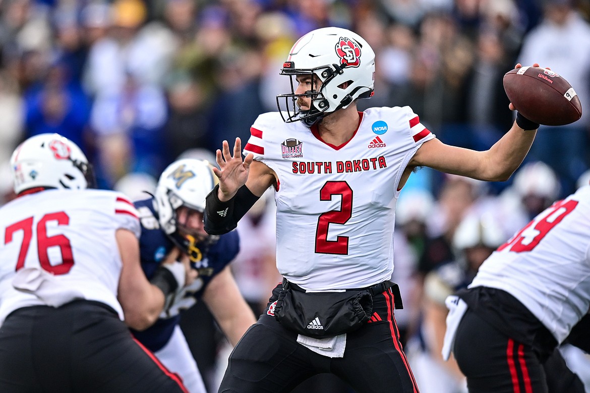 South Dakota quarterback Aidan Bouman (2) drops back to pass in the first quarter during an FCS semifinal game against Montana State at Bobcat Stadium on Saturday, Dec. 21. (Casey Kreider/Daily Inter Lake)