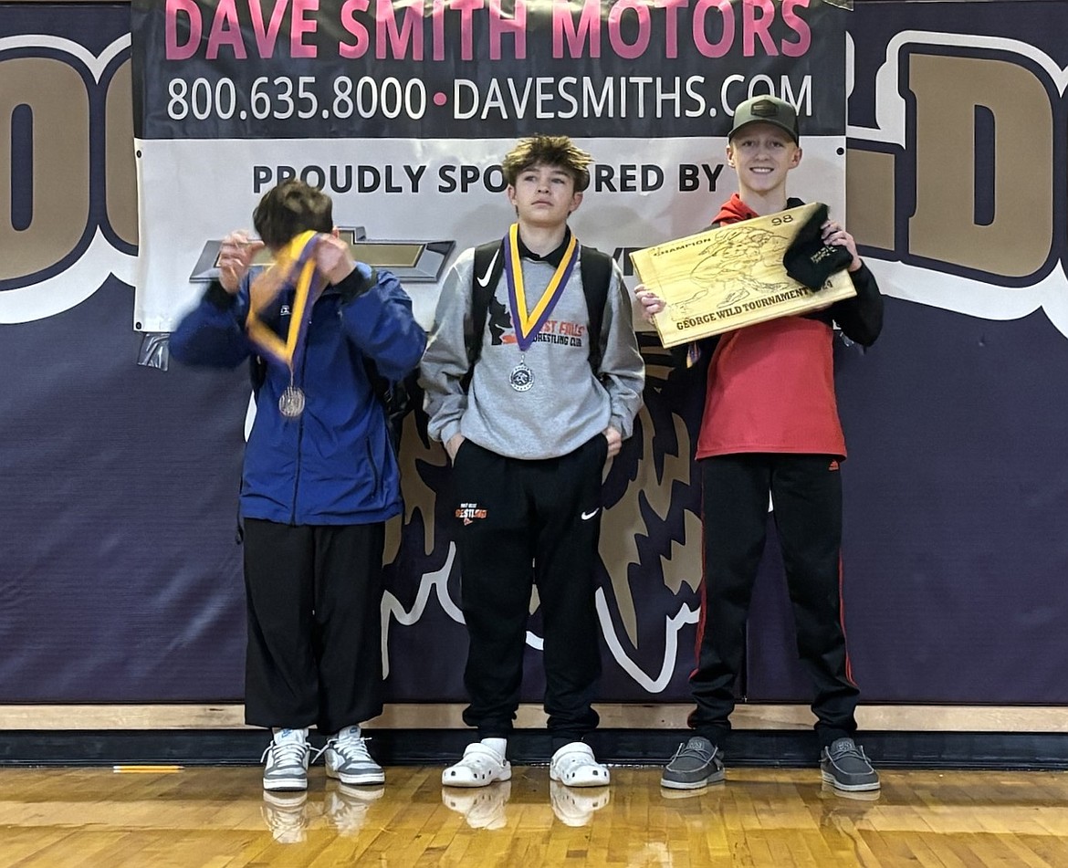 Sandpoint's Ty Wood (right) won the 98-pound bracket of the George Wild Invitational.