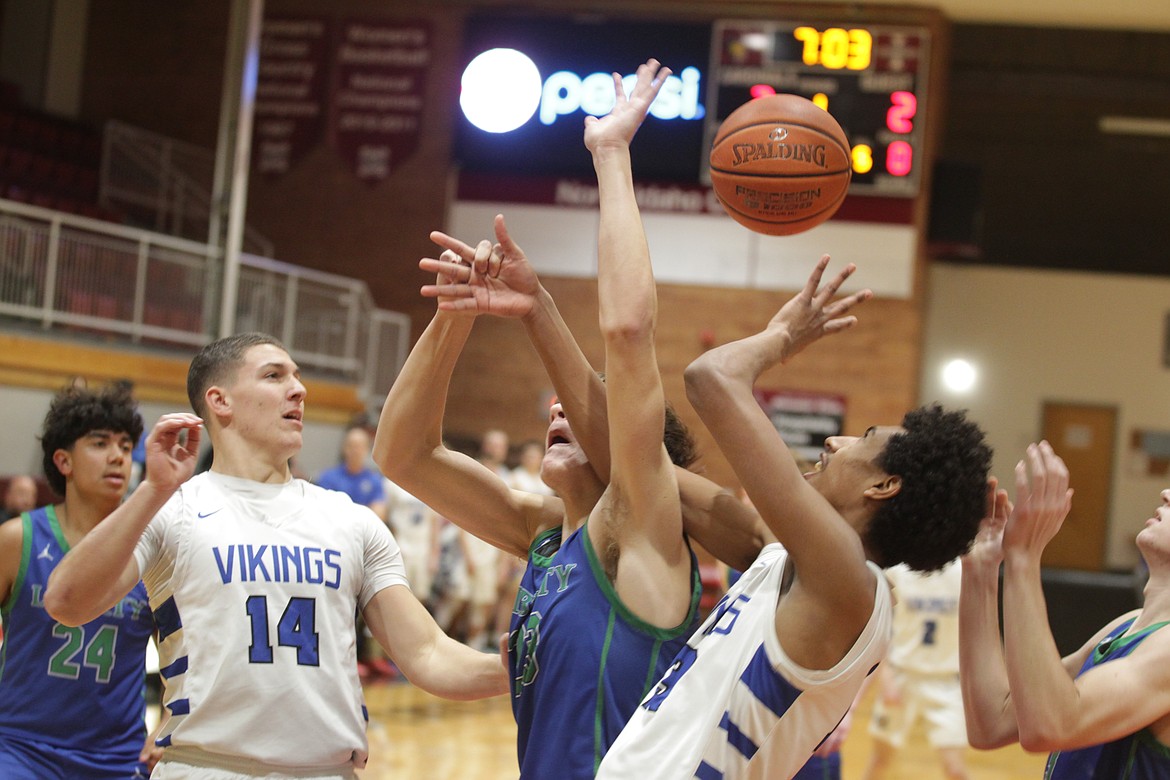 PREP BASKETBALL: Viking boys wind down busy week with win over Liberty ...