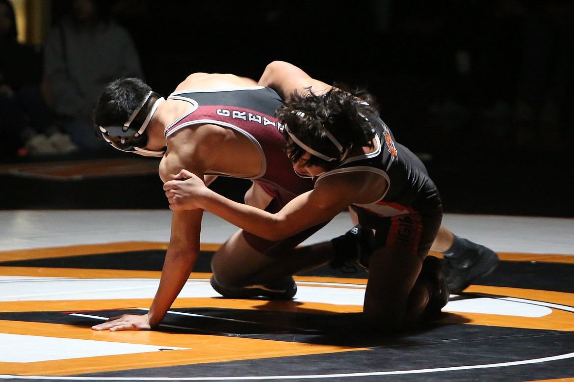 Ephrata junior Carter Garcia, right, won his bout against Grandview’s Gabriel Luna in a 12-10 decision.