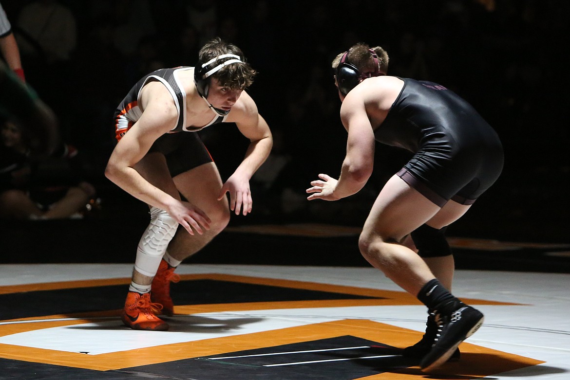 Ephrata junior Tavone Mantese, left, kicked off Thursday’s dual by wrestling against Grandview’s Dutch Graf.