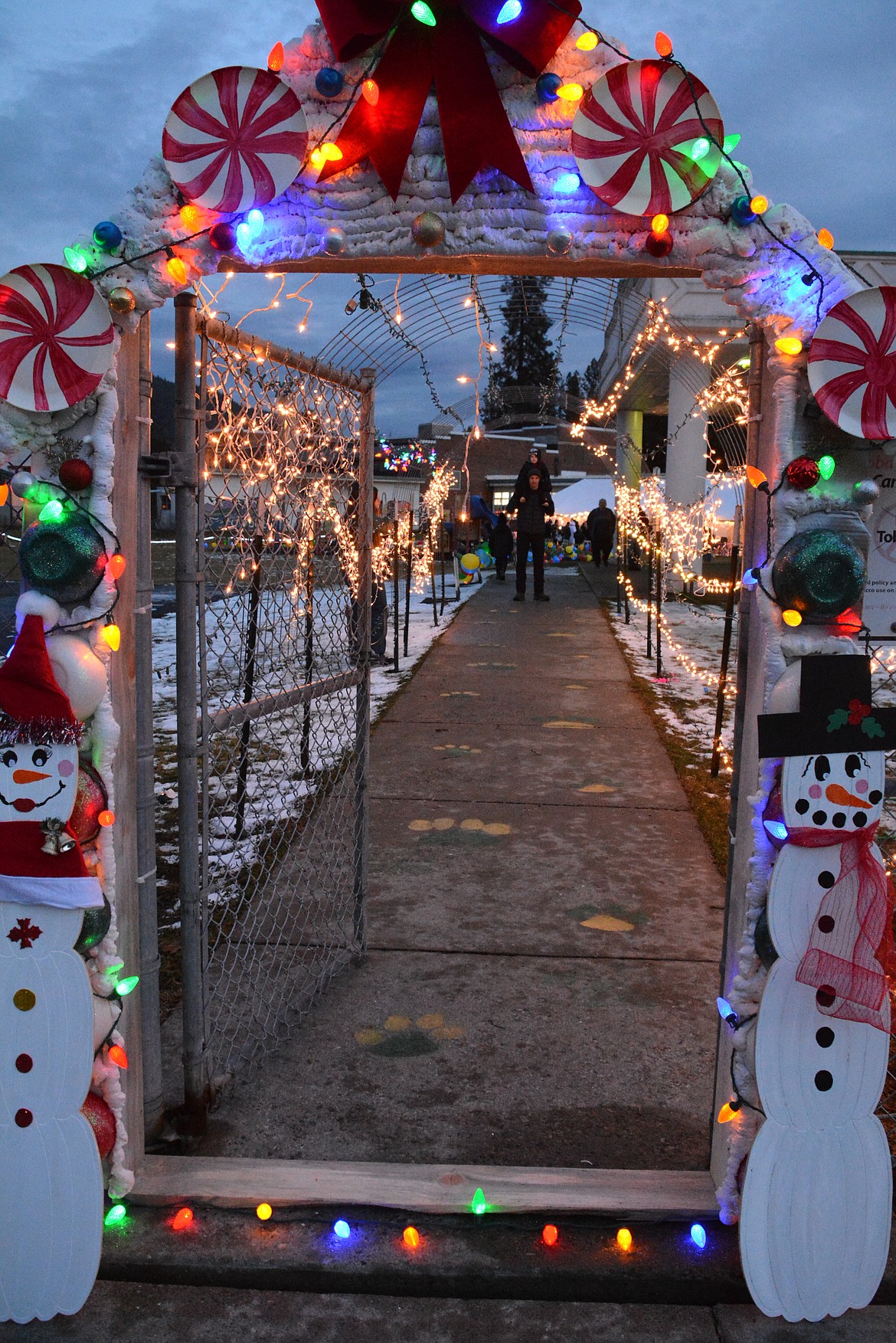 The third annual Winter Festival held outdoors each December on the St. Regis School grounds was lacking snow this year but not holiday spirit. Sliders, mini funnel cakes, and a hot cocoa station kept attendees full, and for entertainment families enjoyed horse drawn wagon rides around the football field. (Mineral Independent/Amy Quinlivan)