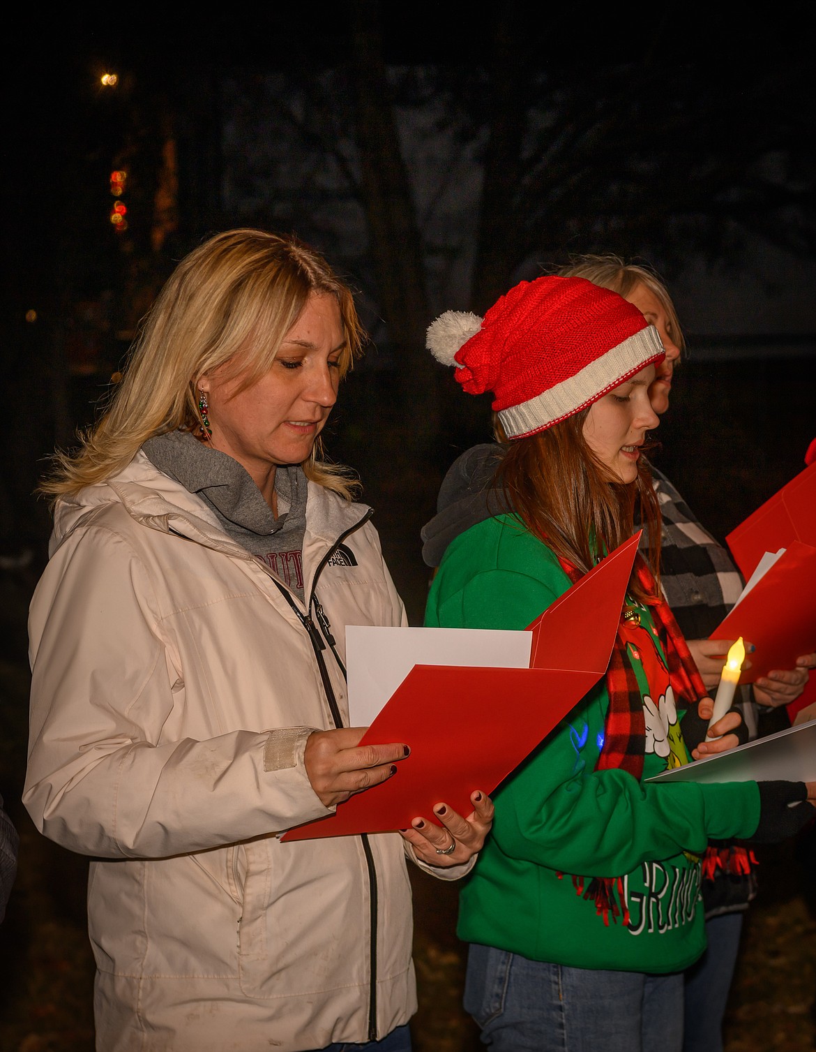 Charity Jermyn and Tania Veremchuk sing during the Plains school choir event at Fred Young Park. (Tracy Scott/Valley Press)