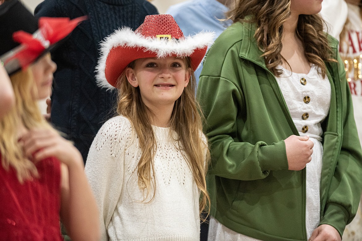 Emma Francom brings some cowboy flair to the grade 5-8 choir concert Tuesday, Dec. 17. (Avery Howe/Bigfork Eagle)