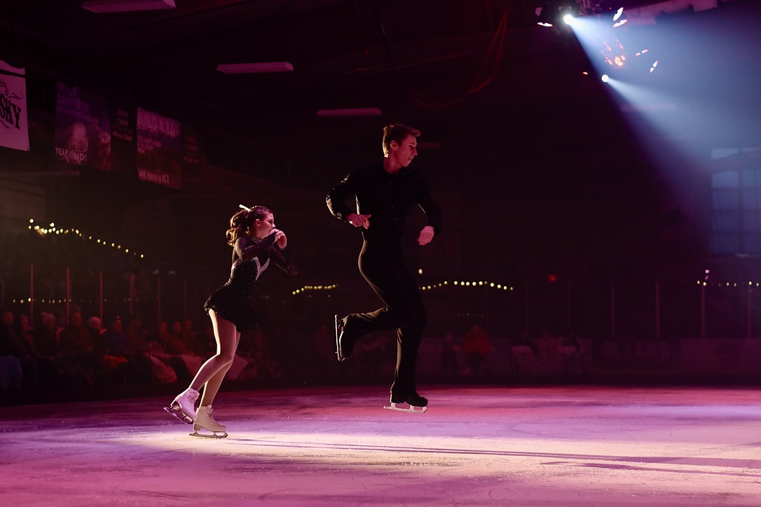 Estelle Muhlner and Vaughn Irwin go airborne at Glacier Skate Academy's Wonderland On Ice show Saturday, Dec. 21 at Stumptown Ice Den in Whitefish. (Matt Baldwin/Whitefish Pilot)