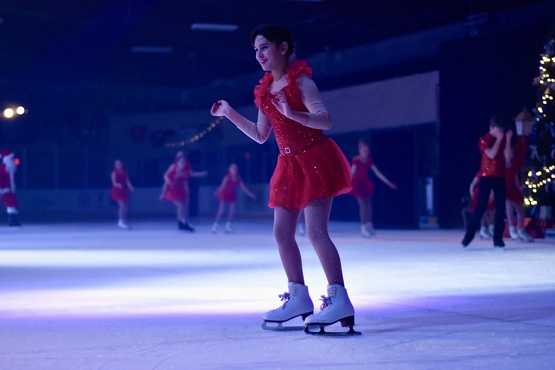 Junior Club skater Isla Baldwin helps close out the show with a fun performance to Joy to the World at Glacier Skate Academy's Wonderland On Ice show Saturday, Dec. 21 at Stumptown Ice Den in Whitefish. (Matt Baldwin/Whitefish Pilot)