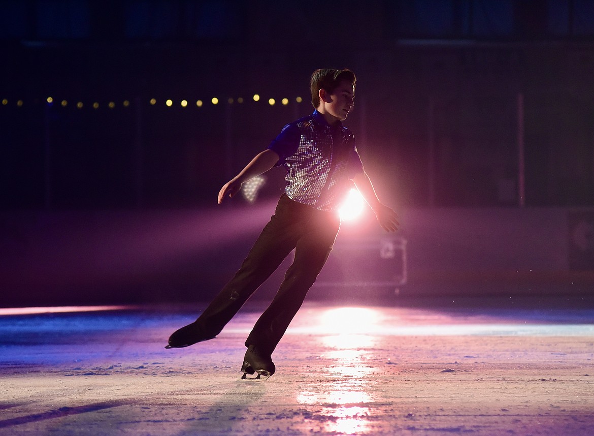 Braxten Quimby dazzles in the spotlight at Glacier Skate Academy's Wonderland On Ice show Saturday, Dec. 21 at Stumptown Ice Den in Whitefish. (Matt Baldwin/Whitefish Pilot)