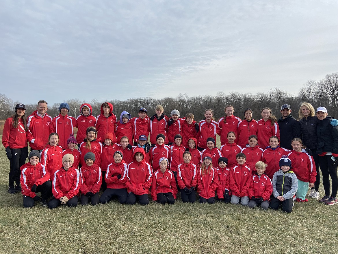 Courtesy photo
The North Idaho Distance Project recently wrapped up the season at the USATF National Junior Olympics on Dec. 14 in Shelbyville, Ind. In the front row are Nolan Anderson, Brody Brulotte, Miles Wood, Evan Wallace, Quinton Wilburn, Landon Thurston, Boheme Parr-Coffin, Julia Carr, Verity Howard, Indy Parr-Coffin, Shepherd Dance and Grant Anderson. In the middle are Peyton Brulotte, Emalyn Bell, Charlotte Carr, Finley Taylor, Hannah Burkwist, Summer Dance, Brooklyn Caywood, Olivia Betz, London Dance, Vivian Howard, Kalia Blanchard, Tory Howard, Paloma Parr-Coffin, Gracie McVey. In the back are head coach Allison Howard, coach Dave Dance, Noah Garrido, Wyatt Matous, Rowan Henry, Charlie McVey, Riley Lechleitner, Drew Grady, Hunter Pitsch, Miro Parr-Coffin, Lily Alberton, Ruthie Laughridge, Violet Hernandez, Emmaline Carr, coach Austin Anderson, coach Holly Matous and coach Channing Dance.