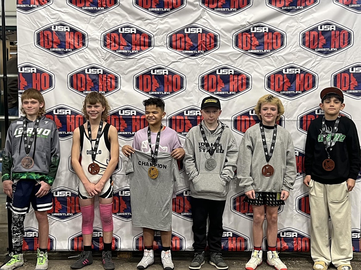 Dalton Regehr, third from right, of the Bonners Ferry Wrestling Club, wrestled to a second-place finish in the 90-pound bracket at the Idaho Middle School State Wrestling Championship held this past Saturday at the Idaho Ford Center in Nampa. Regehr went 4-1 on the day, winning all four of his matches by first round pin leading up to the championship match.