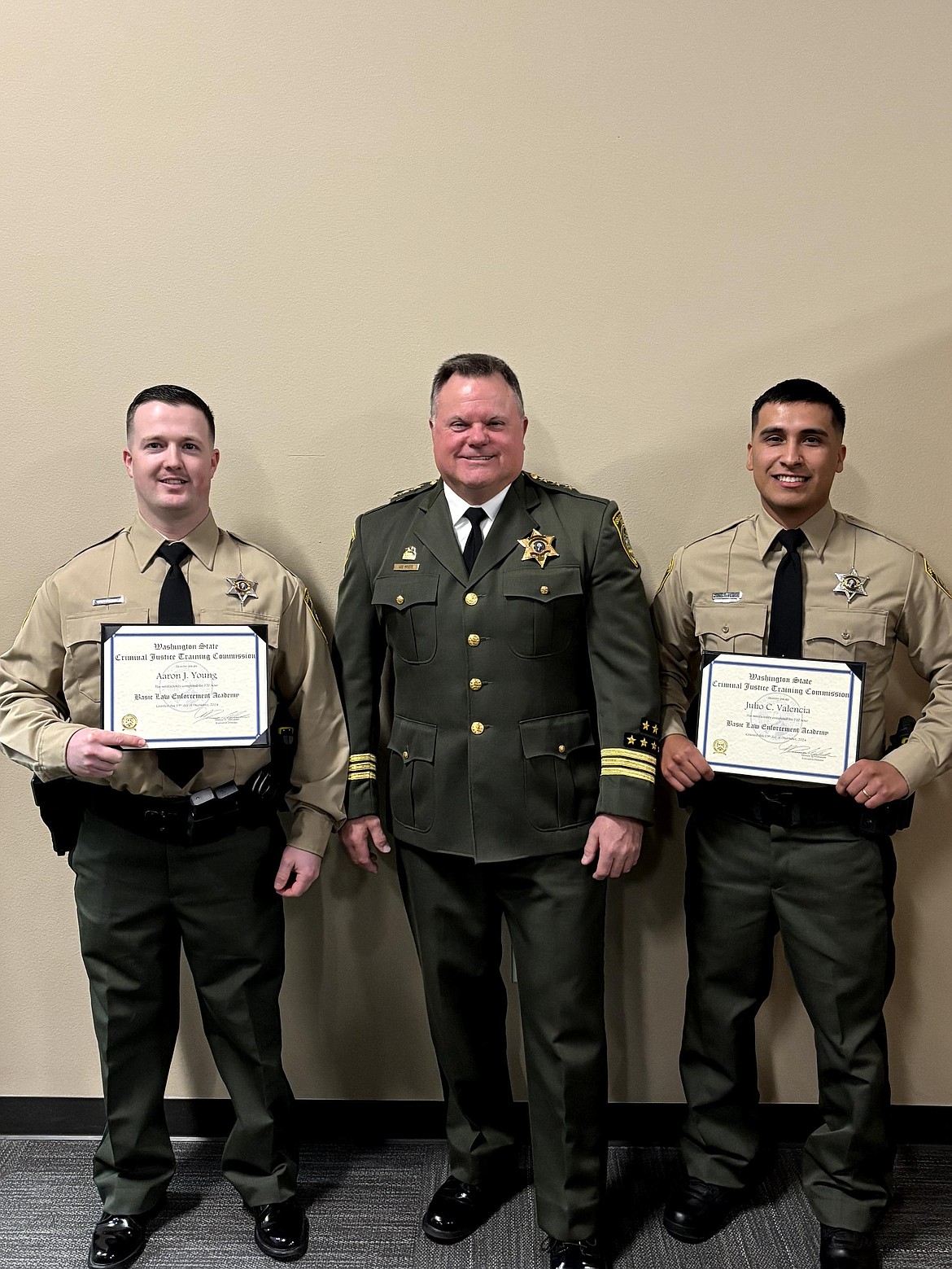 Grant County Sheriff Joey Kriete, center, attended the Basic Law Enforcement Academy Graduation for deputies Aaron Young, left, and Julio Valencia, right. Kriete has been recruiting since coming into office and has been able to fill many of the vacancies at GCSO.