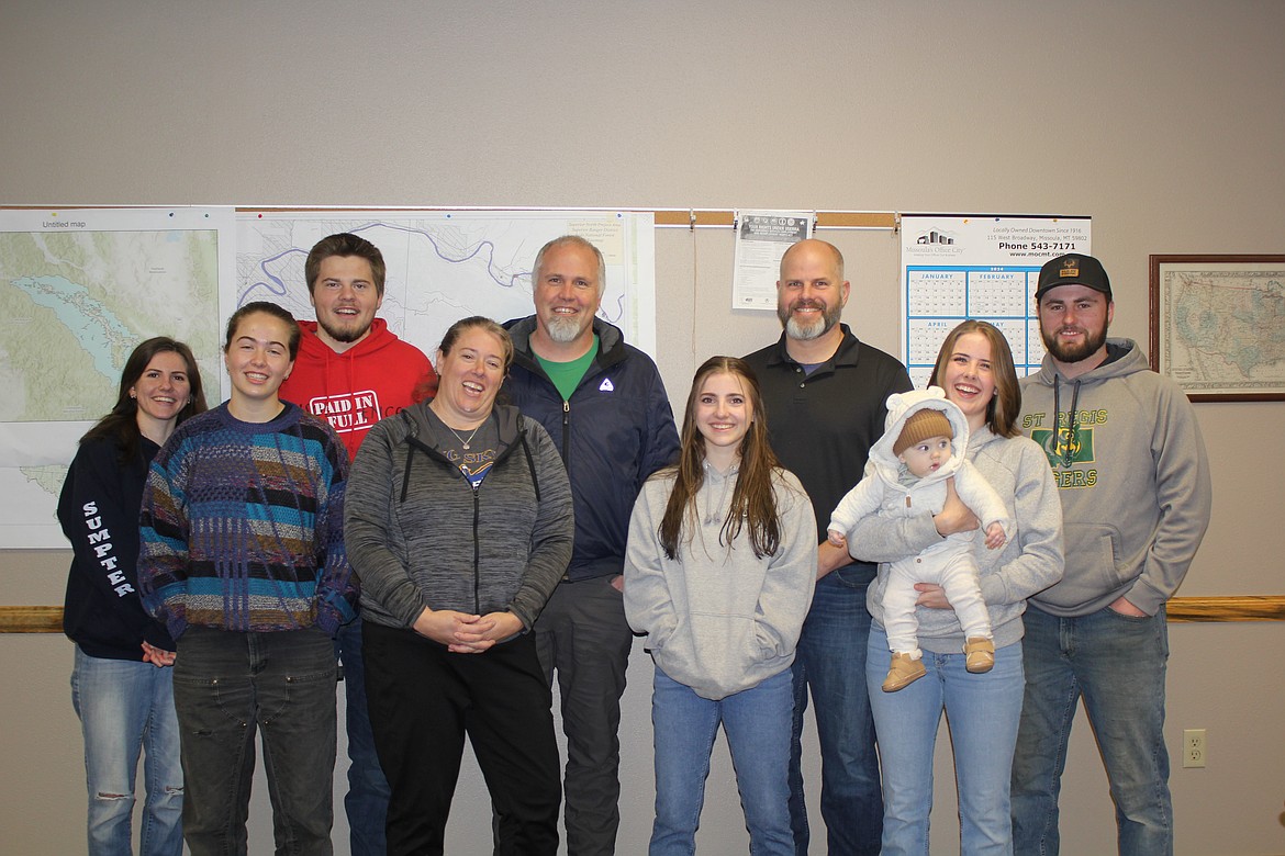 The family of Shawn Smalley (back row, second from left) attended his swearing in as the newest commissioner for Mineral County on Friday, December 27. Smalley replaces Dawn Terrill who has appointed to her position in 2022.