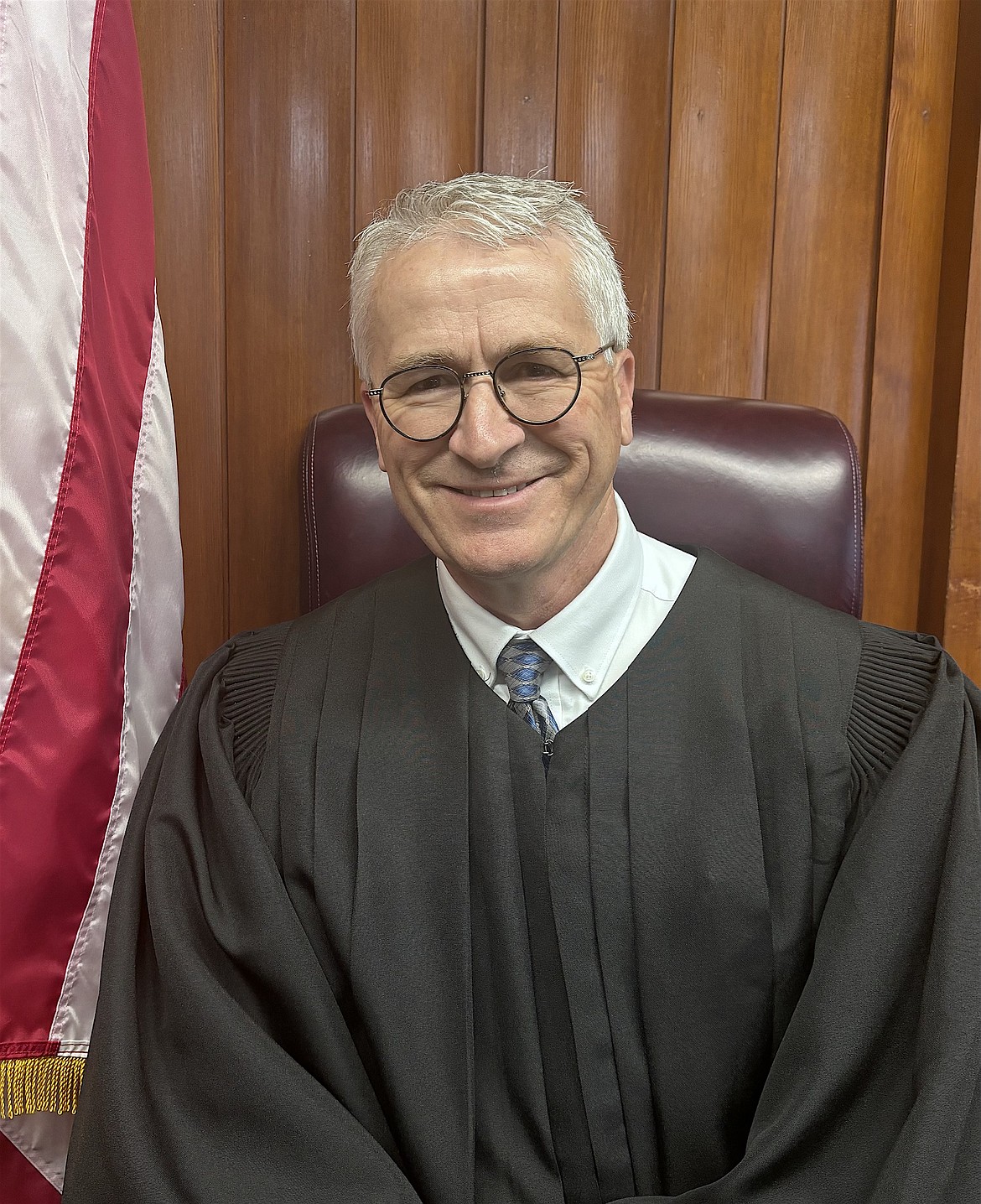Judge John Mercer donned his black robes again Wednesday, after Gov. Greg Gianforte reappointed him to a two-year term in the 20th Judicial District.