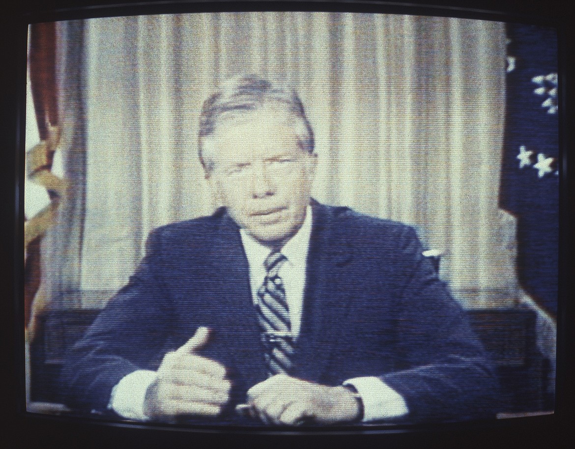 The TV screen lights up with former President Jimmy Carter’s image. Carter grew up as a peanut farmer in Georgia, went to school, joined the navy, started into politics, became president then spent the rest of his life trying to help others with his nonprofit and volunteer work.