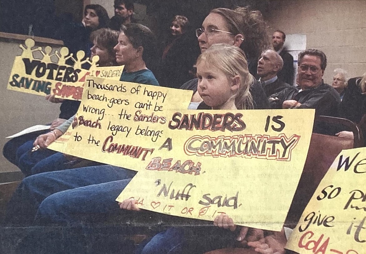 In 2005, Jadyn Smith, 5, protests with her mother, Jennifer, during a public discussion about Sanders Beach.