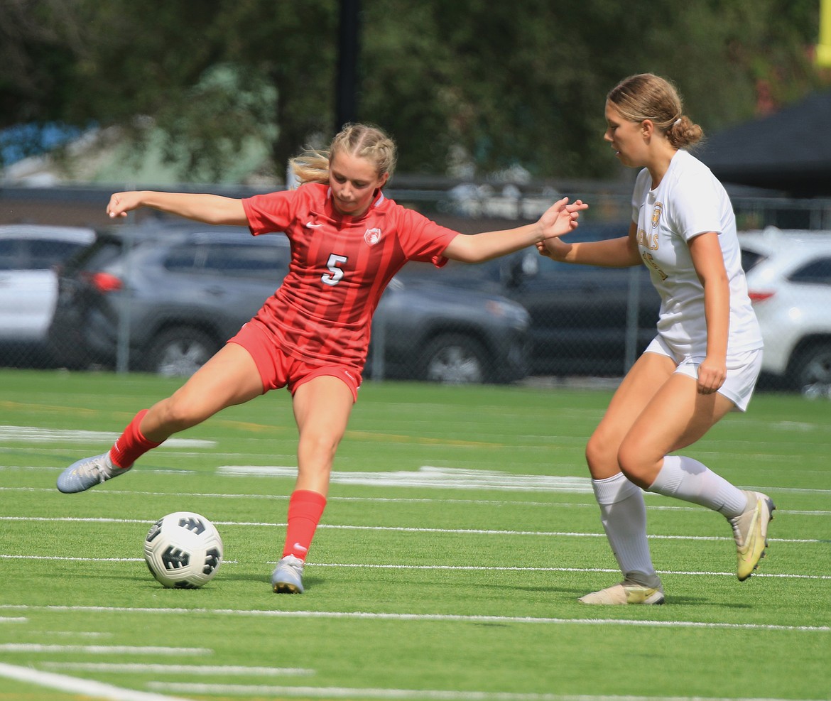 Sandpoint's Sam Leaverton makes a move on a Lewiston defender during a home game  at War Memorial Field.