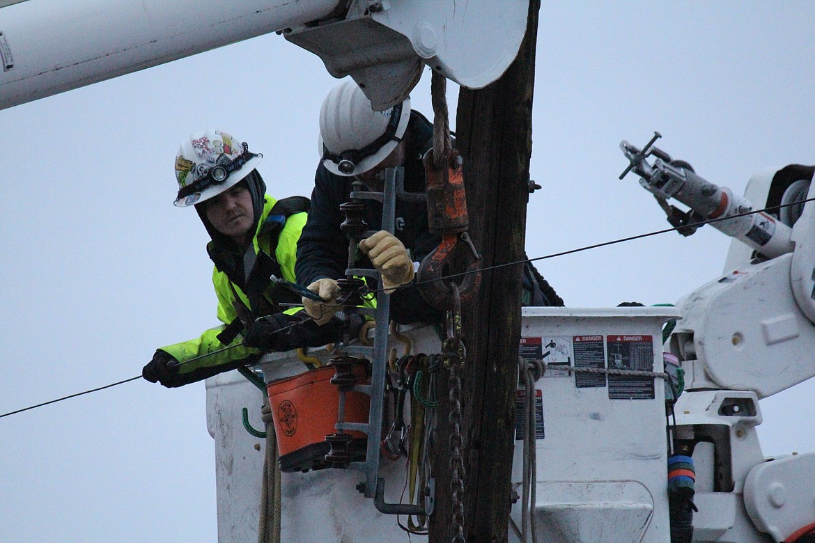 Replacing a power pole involves work in tricky places.