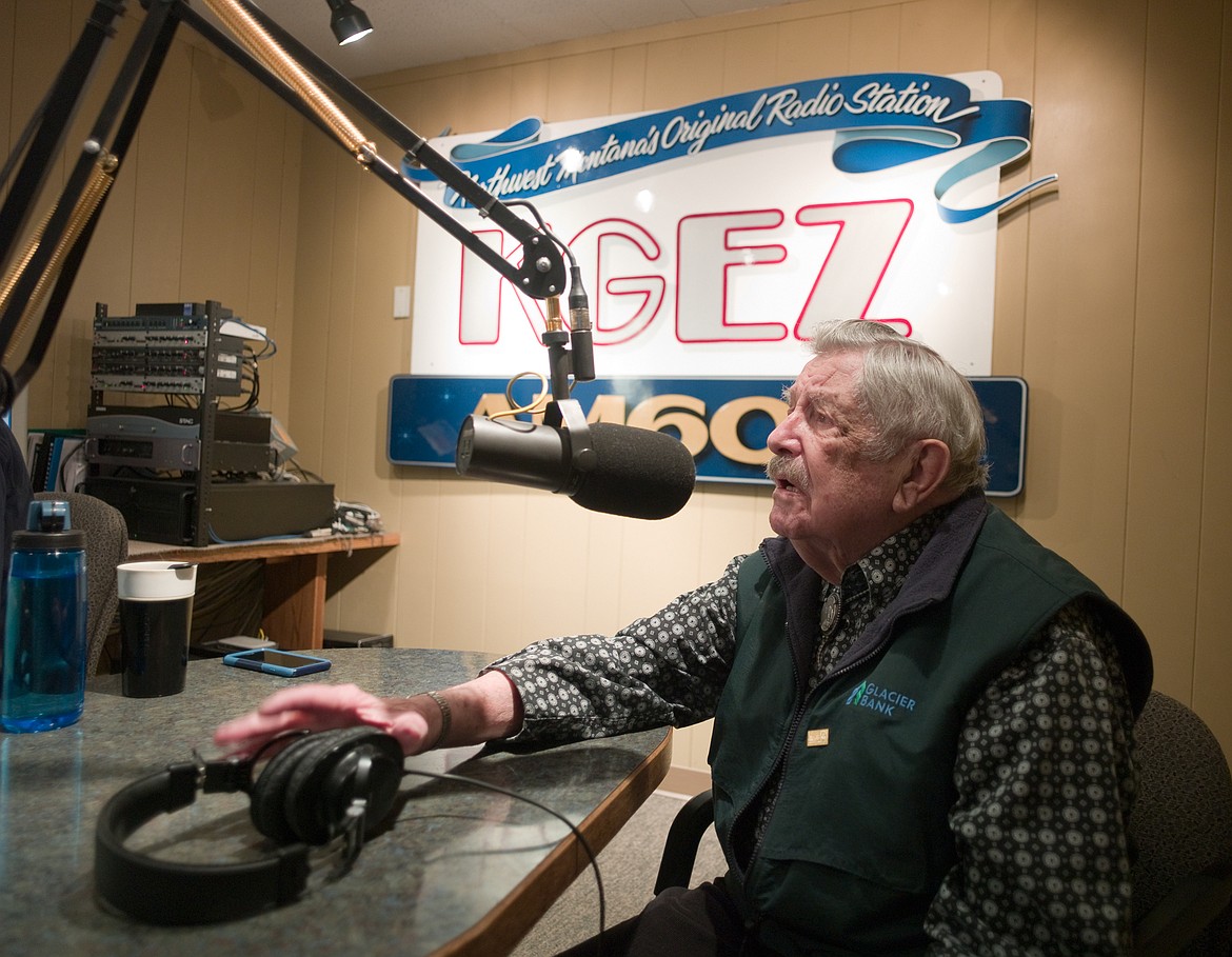 George Ostrom gives his morning report from the studio of KGEZ radio in 2016. (Chris Peterson/Hungry Horse News FILE)