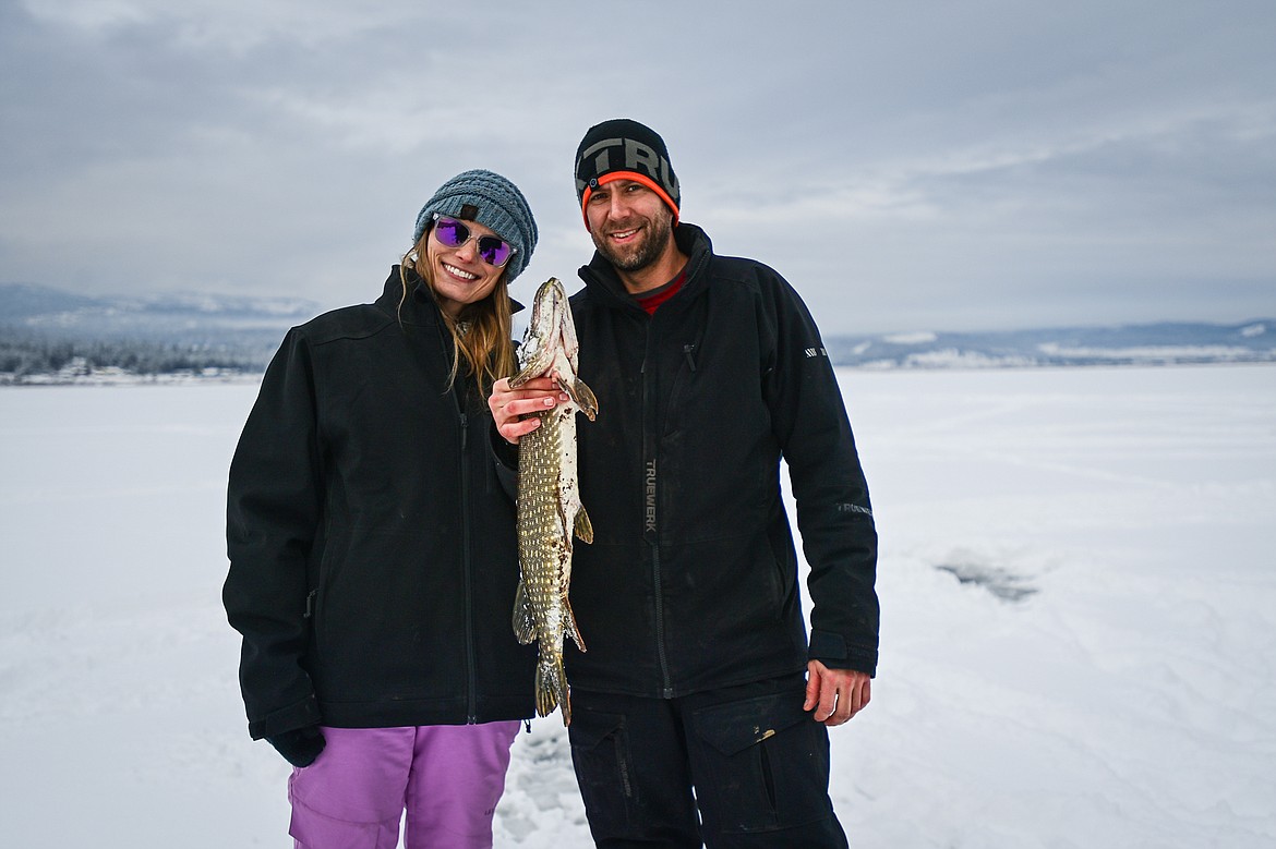 Kati and Aaron Anderson hold a northern pike they caught that weighed in at 3.89 pounds at the 53rd annual Sunriser Lions Ice Fishing Derby on Smith Lake in Kila on Saturday, Jan. 4. (Casey Kreider/Daily Inter Lake)