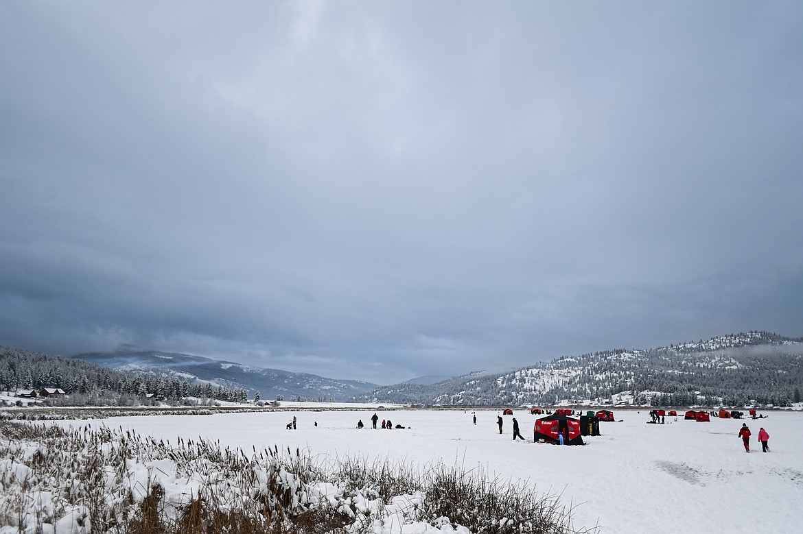 Ice fishing tents are spread out across the frozen surface of Smith Lake at the 53rd annual Sunriser Lions Ice Fishing Derby in Kila on Saturday, Jan. 4. (Casey Kreider/Daily Inter Lake)