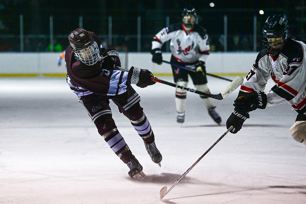 Griz forward Jackson Knutsen (22) shoots in the first period against Eastern Washington during the Winter Classic at Woodland Park Ice Rink in Kalispell on Saturday, Jan. 4. (Casey Kreider/Daily Inter Lake)