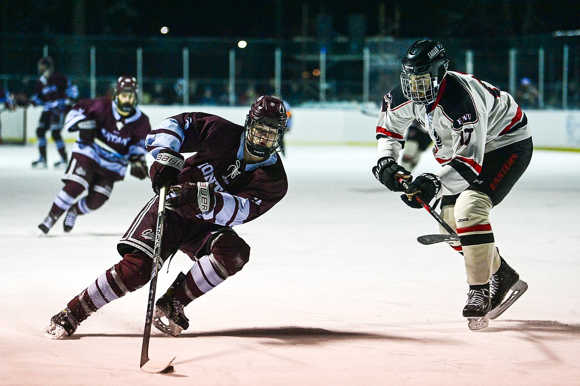 Griz forward Max Toijala (3) pushes the puck into the Eastern Washington zone in the first period of the Winter Classic at Woodland Park Ice Rink in Kalispell on Saturday, Jan. 4. (Casey Kreider/Daily Inter Lake)