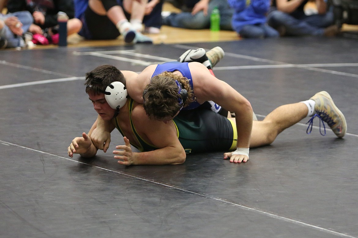 A pair of wrestlers from Northwest Christian (Colbert) and Tonasket take each other on at Saturday’s Banks Lake Brawl in Coulee City.