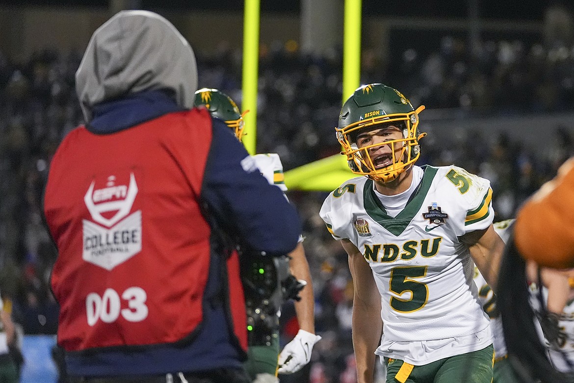 North Dakota State wide receiver Bryce Lance reacts toward a television camera after scoring a touchdown catch against Montana State during the first half of the FCS Championship NCAA college football game, Monday, Jan. 6, 2025, in Frisco, Texas. (AP Photo/Julio Cortez)