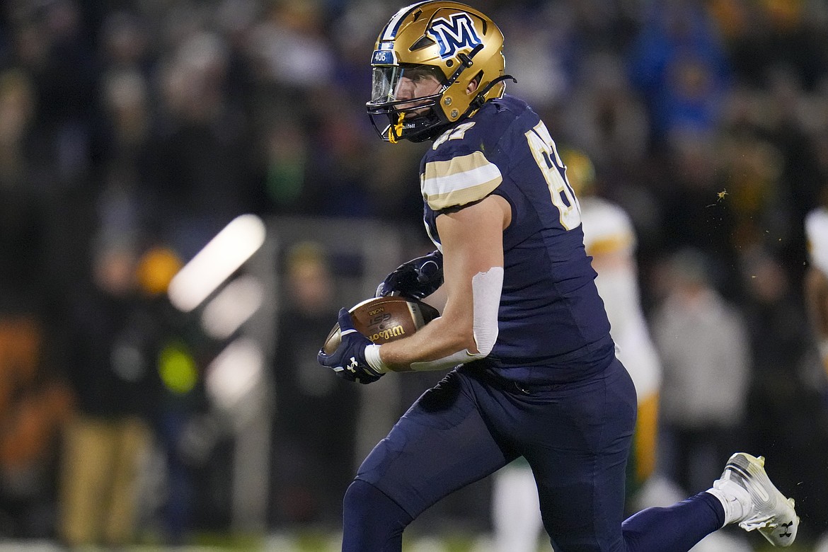 Montana State tight end Ryan Lonergan runs with the ball after making a catch against North Dakota State during the second half of the FCS Championship NCAA college football game, Monday, Jan. 6, 2025, in Frisco, Texas. North Dakota State won 35-32. (AP Photo/Julio Cortez)