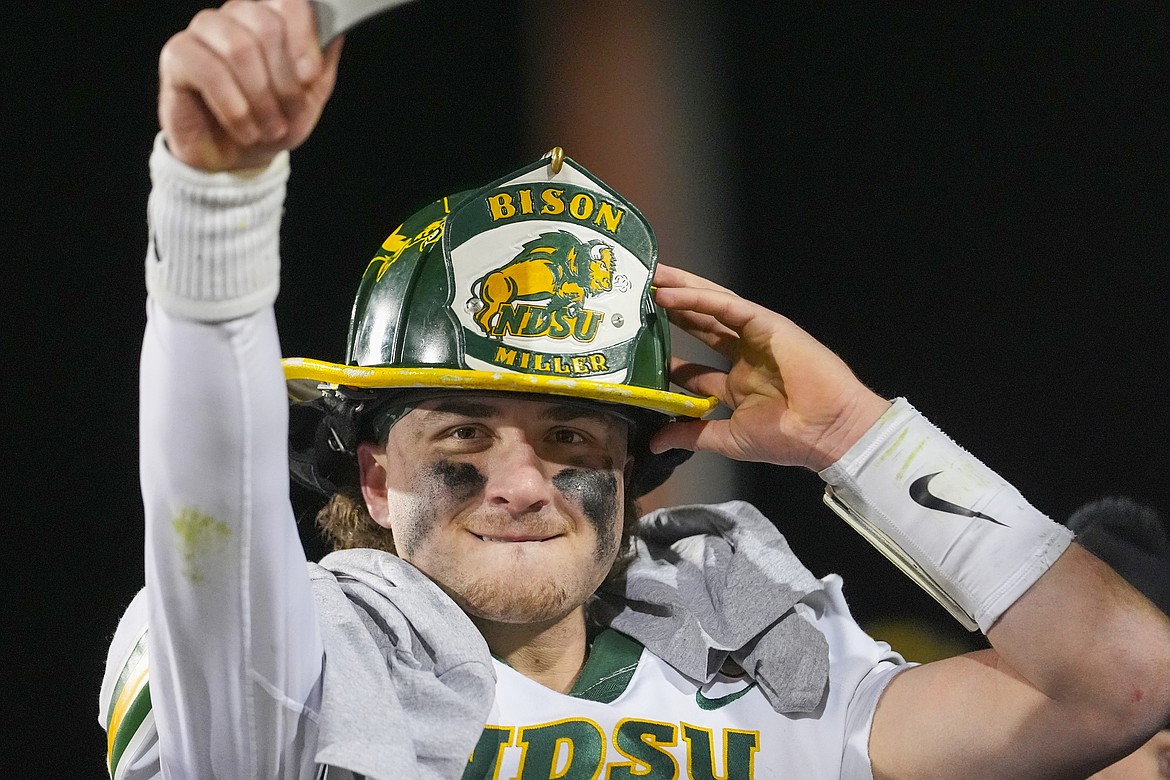 North Dakota State quarterback Cam Miller reacts following the FCS Championship NCAA college football game against Montana State, Monday, Jan. 6, 2025, in Frisco, Texas. North Dakota State won 35-32. (AP Photo/Julio Cortez)