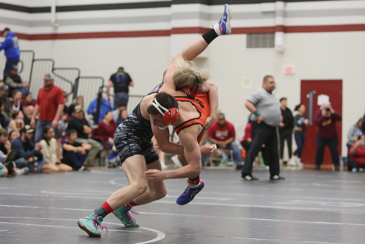 Lind-Ritzville/Sprague’s Carson Kubik, left, takes down his opponent at Saturday’s Banks Lake Brawl in Coulee City.