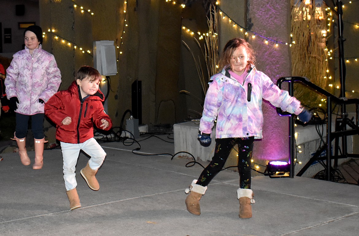 Children dance to the music at the 2024 tree lighting sponsored by the Downtown Moses Lake Association.