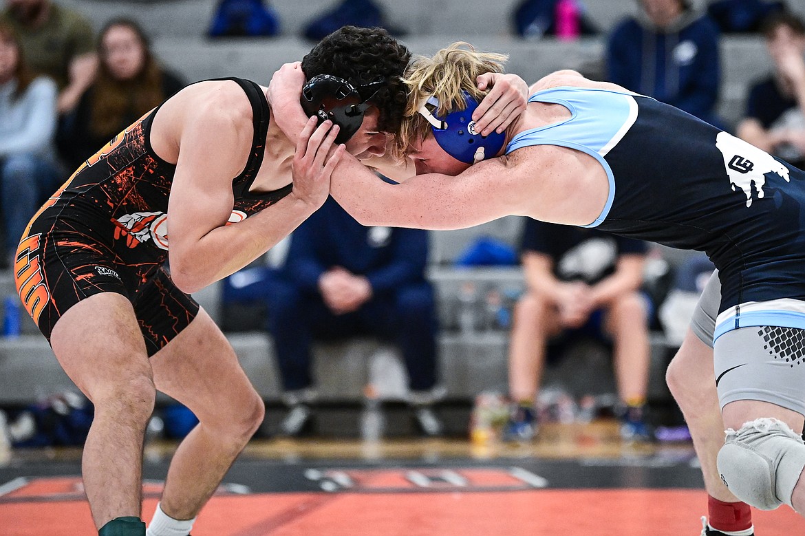 Flathead's Diesel Thompson wrestles Great Falls' Cael Floerchinger at 132 lbs. at Flathead High School on Saturday, Dec. 7. (Casey Kreider/Daily Inter Lake)