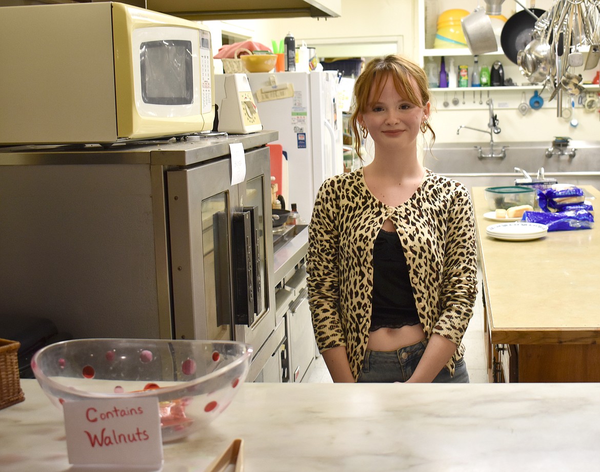 Madalyn Buchanan stands in the Soap Lake Community Center kitchen, where she and her sister Emma alternate weeks making food to sell at Open Mic Night. The sisters hope to open their own restaurant someday, Madalyn said.