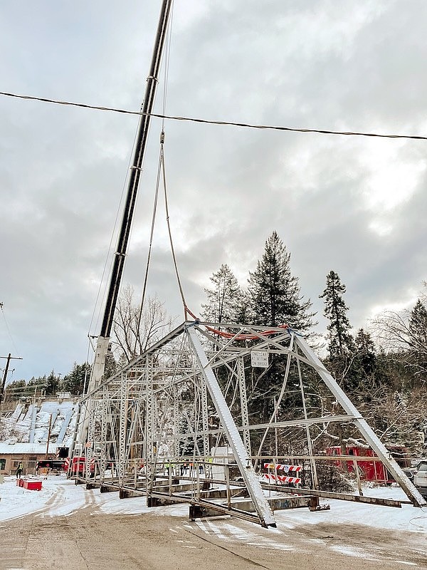 Montana Department of Transportation and Battle Ridge Builders work to dismantle Bridge Street Bridge. (Courtesy/ Dawn May Photography)