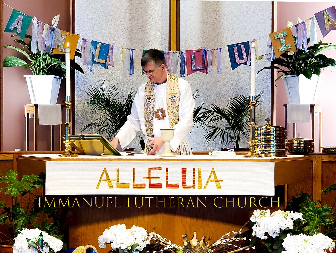 Pastor Walter Klockers leads an Easter Sunday liturgy at Immanuel Lutheran Church.