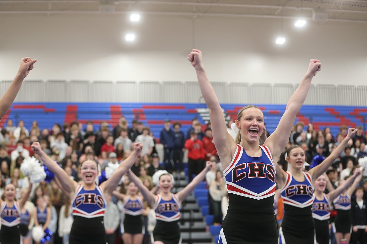 Coeur d'Alene High school cheer captain and senior Sophia McGinnis-Green, front right, helps lead the school in Fight for the Fish spirit cheers Tuesday during practice ahead of Friday's games against Lake City High.