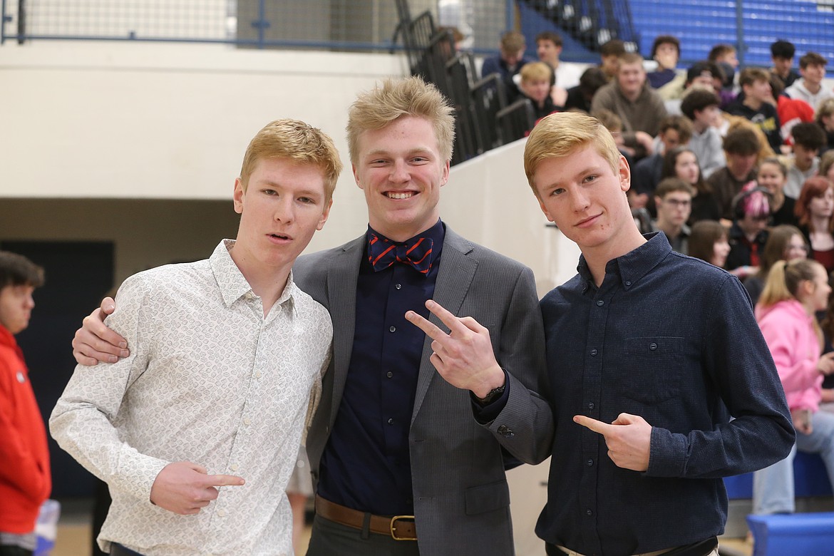 From left, Coeur d'Alene High School seniors Payson Irwin, Tyler Voorhees and Cooper Irwin are ready for the fish to swim back as they pose for a photo Tuesday. “We’re taking it this year," Tyler said. "This is our year.”