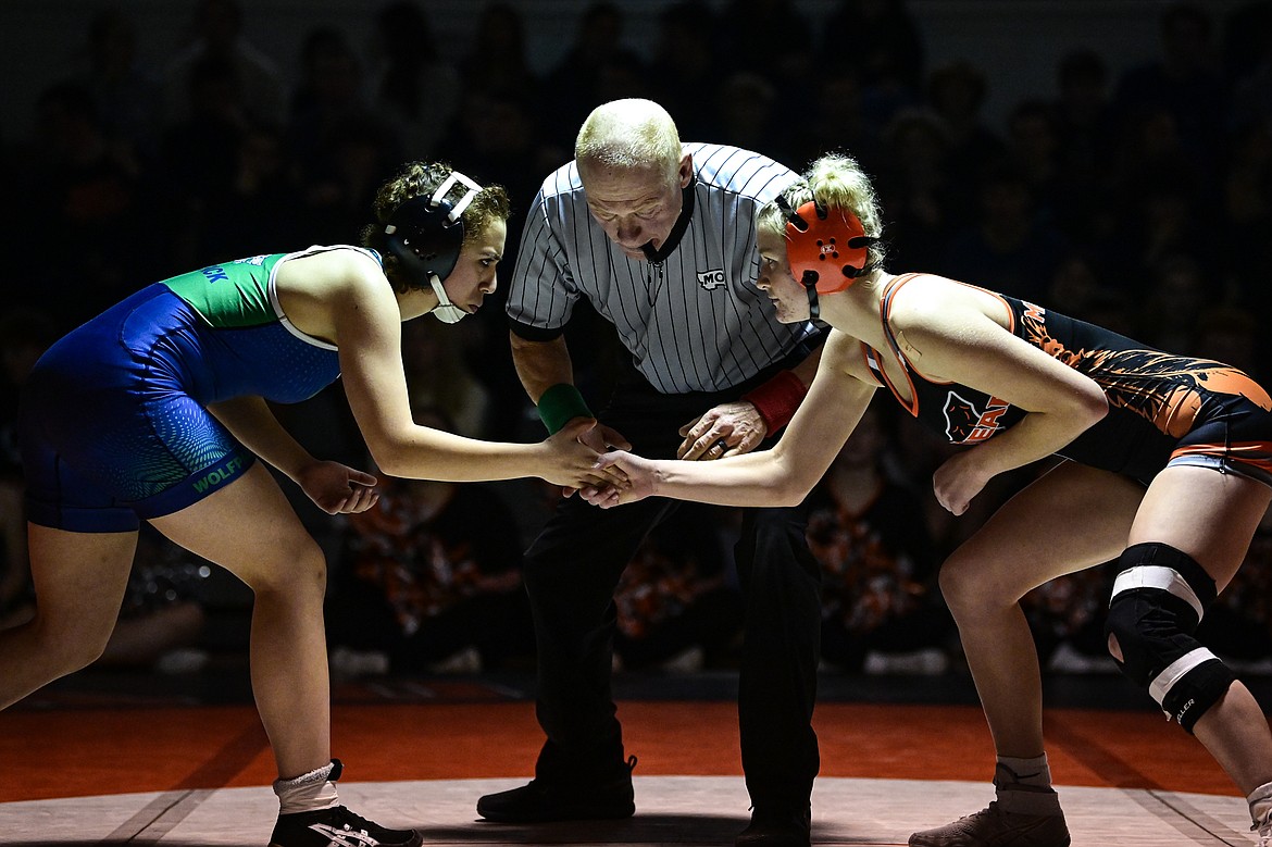 Glacier's Auttem Kostelecky and Flathead's Brynn Mailman square off at 125 pounds at Flathead High School on Thursday, Jan. 9. (Casey Kreider/Daily Inter Lake)