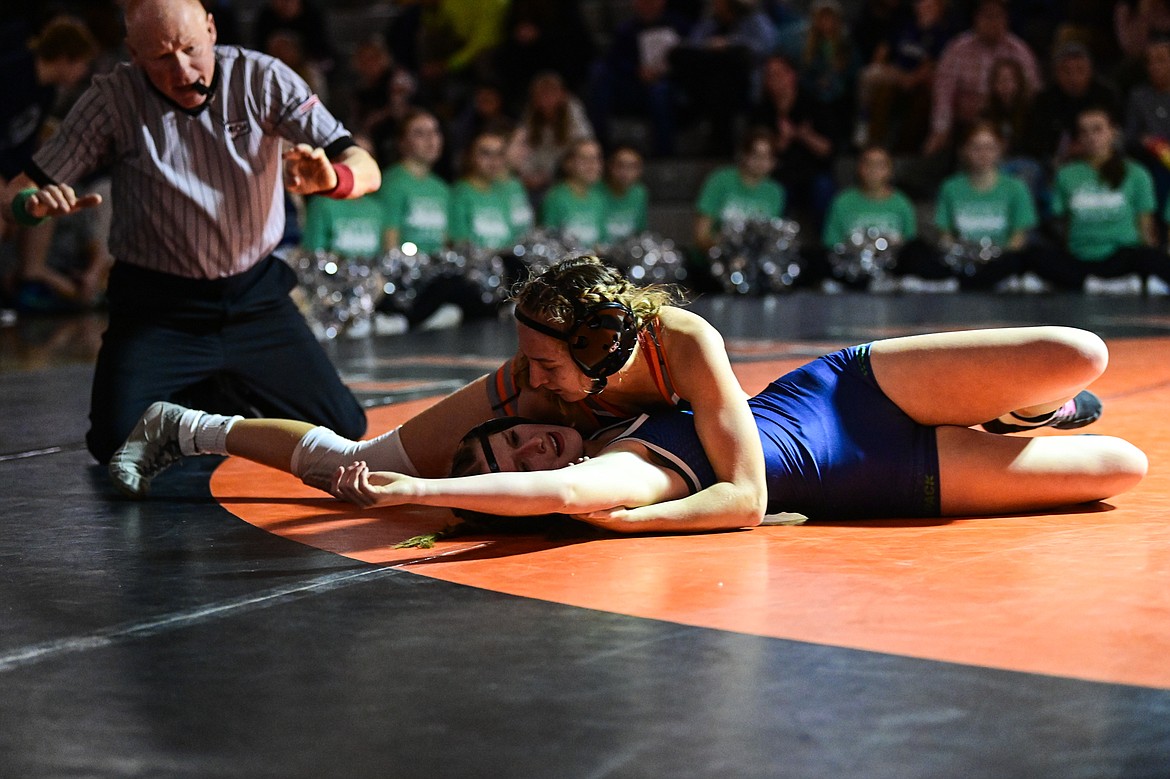 Flathead's Julia Kay pins Glacier's Ella Labrum at 125 pounds at Flathead High School on Thursday, Jan. 9. (Casey Kreider/Daily Inter Lake)