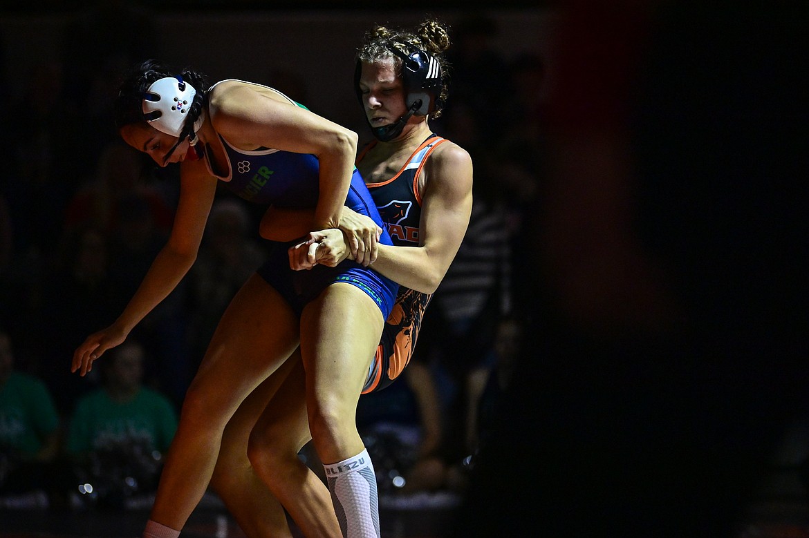 Flathead's Bella Downing wrestles Glacier's Mikaela Julius at 115 pounds at Flathead High School on Thursday, Jan. 9. (Casey Kreider/Daily Inter Lake)