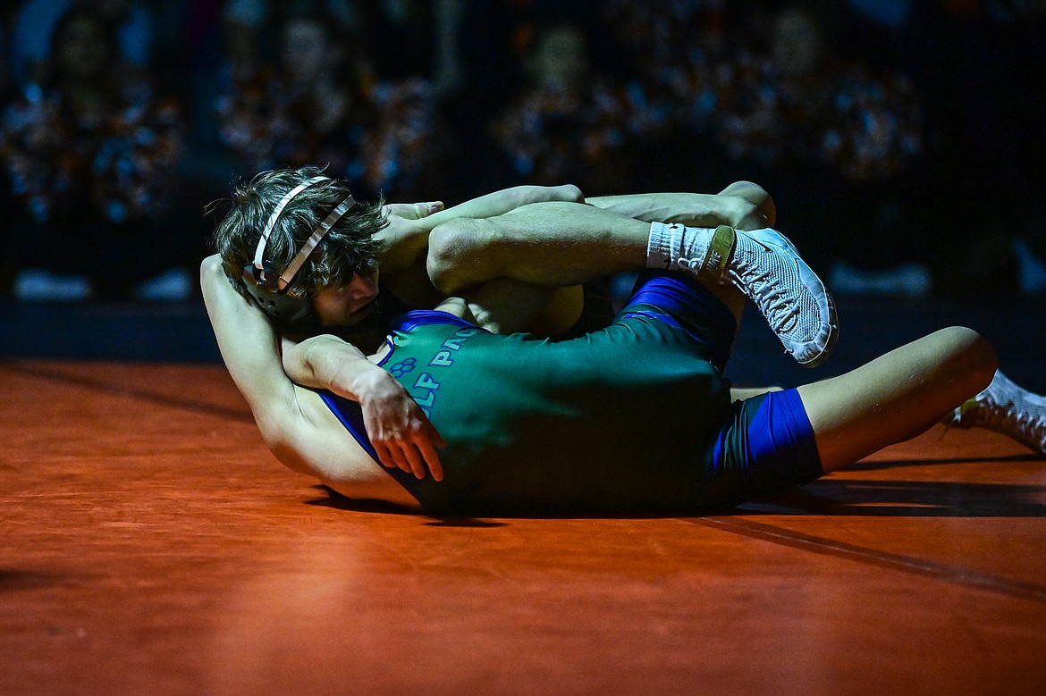 Flathead's Dayton Naldrett wrestles Glacier's Aiden Sweat at 110 pounds at Flathead High School on Thursday, Jan. 9. (Casey Kreider/Daily Inter Lake)