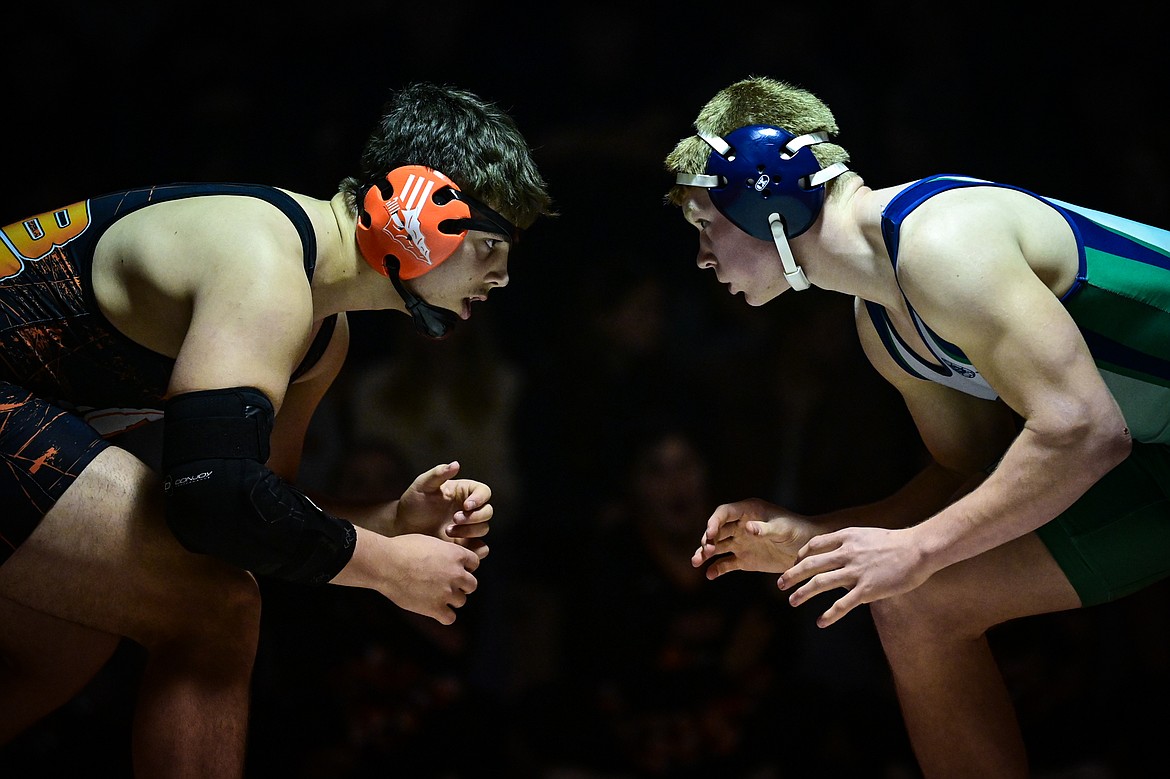 Flathead's Conor LeDuc and Glacier's Chase Chaffin tie up at 215 pounds at Flathead High School on Thursday, Jan. 9. (Casey Kreider/Daily Inter Lake)