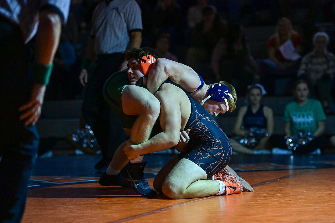 Flathead's Conor LeDuc wrestles Glacier's Chase Chaffin at 215 pounds at Flathead High School on Thursday, Jan. 9. (Casey Kreider/Daily Inter Lake)