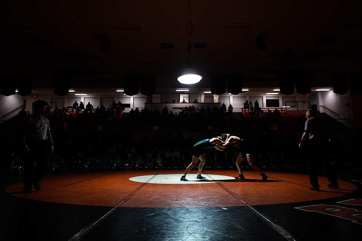 Glacier's Matthew Ahner wrestles Flathead's Cliff Nance at 175 pounds at Flathead High School on Thursday, Jan. 9. (Casey Kreider/Daily Inter Lake)