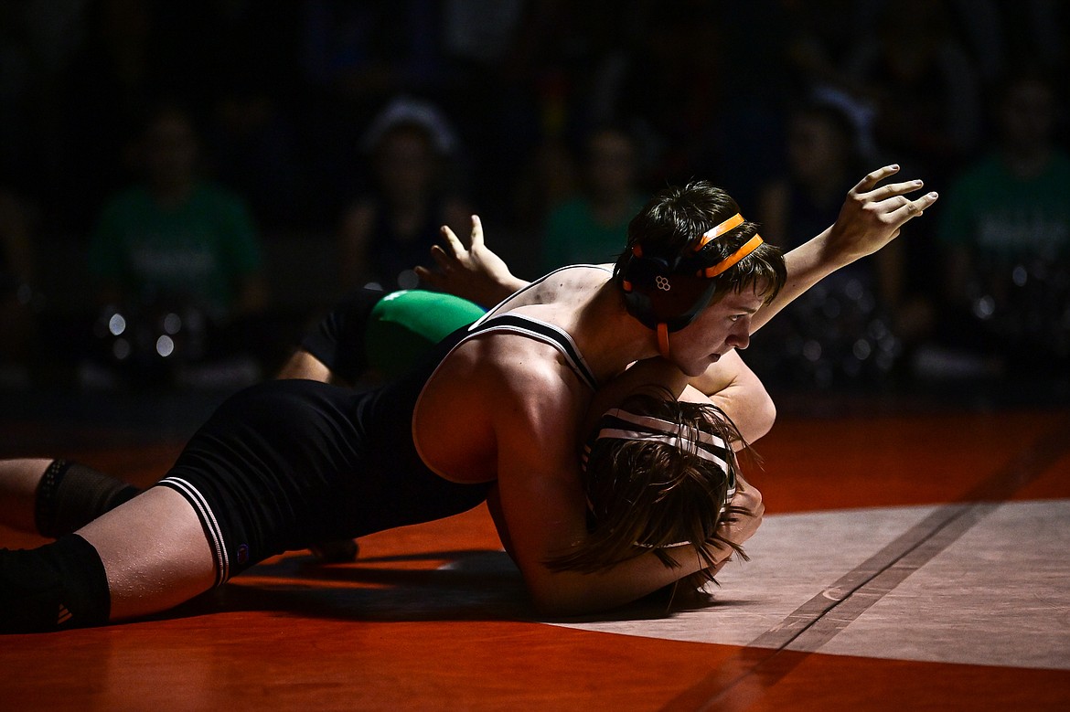 Flathead's Aiden Downing pins Glacier's Jaden Beston at 144 pounds at Flathead High School on Thursday, Jan. 9. (Casey Kreider/Daily Inter Lake)