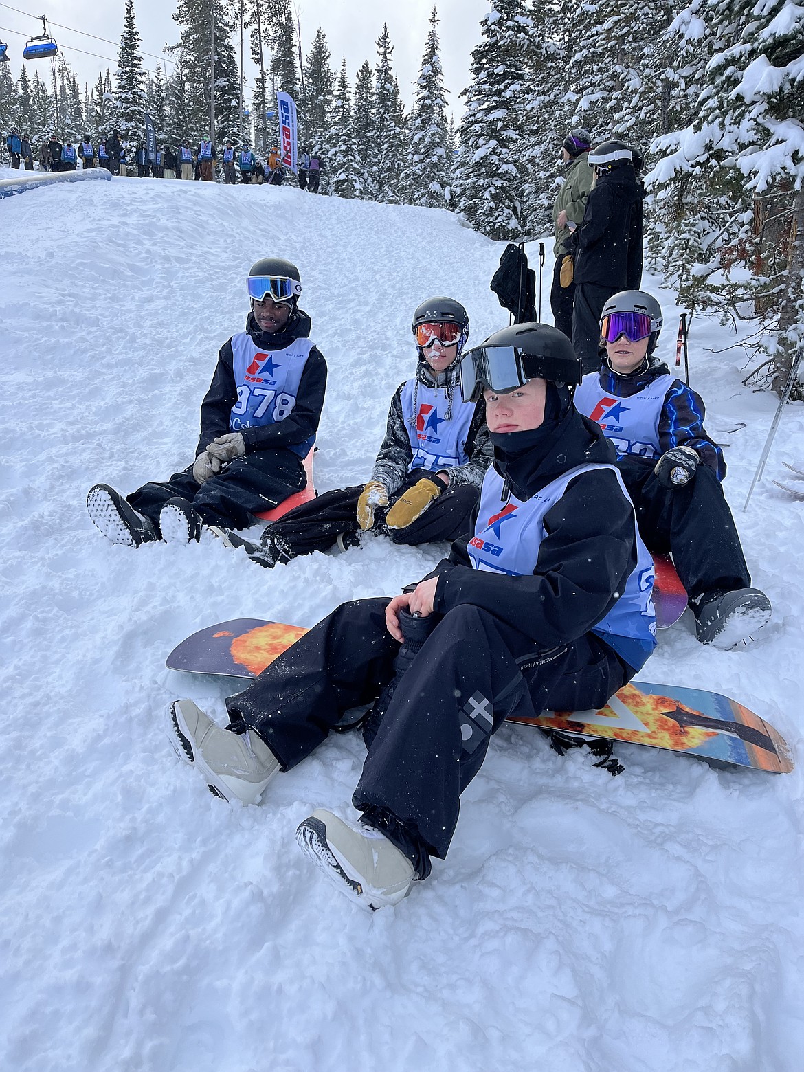 From left, locals Calvin Schmidt, Drew Falcone, Owen Miller and Cade Hanson sit atop the slope while at Saturday's competition.